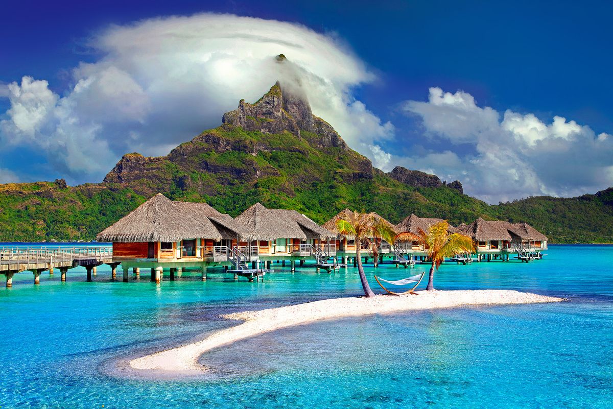 Overwater accommodation beside a tropical island